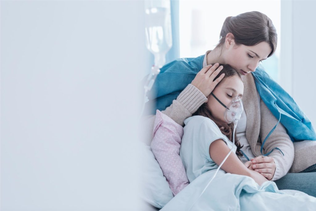 Mom with daughter at a Hospital.
