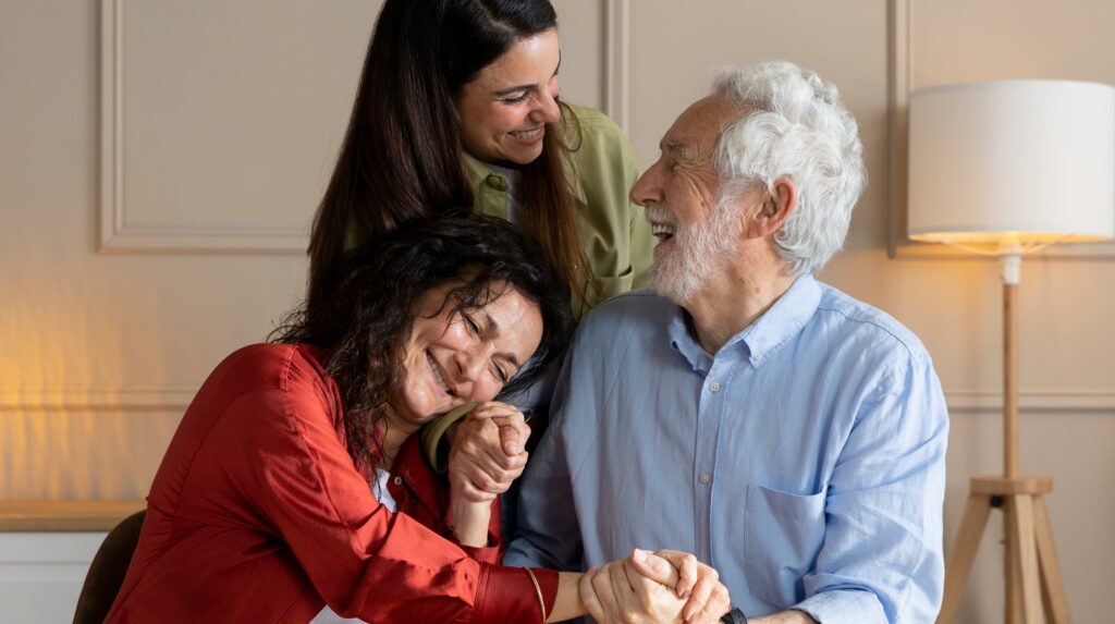 Happy family huging grandpa, an alzheimer's patient